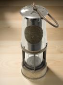 An Eccles type NC40 brass and chrome miner's lamp