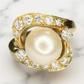 An 18ct gold pearl and diamond ring, approximately 0.6ct, size N CONDITION REPORT: 7.