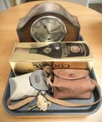 A Bentima Art Deco mantle clock, bottle of Celebration cognac in carton, Genos bakelite camera,