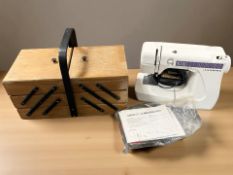A concertina sewing box and a Janome electric sewing machine with lead and pedal
