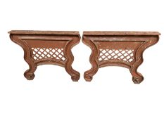 A pair of cast iron painted metal bench feet,