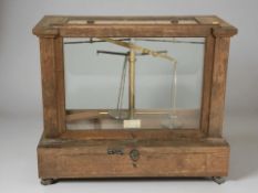 A mahogany cased balance scale,