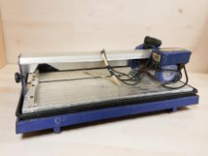 A 600W bridge saw tile cutter