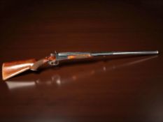 A Baikal 12 bore shotgun, side by side, P18511, model IJ 58M, 28.5 '' barrels with double trigger.