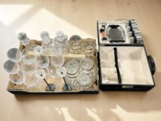 A group of Royal Doulton crystal wine glasses, further glasses and decanters,