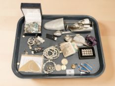 A group of costume jewellery, Zippo lighter, shoe lasts,