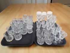 A collection of crystal drinking glasses (two trays)