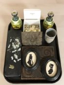 A pair of antique silver rimmed vases, dominoes, two carved oak panels,