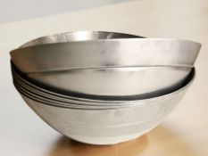 Seven large aluminium bowls,
