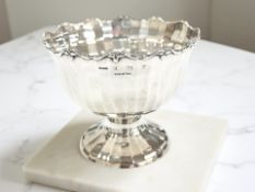 A George V silver sugar bowl, Constantine & Floyd Ltd, Birmingham 1914, diameter 10.5cm.