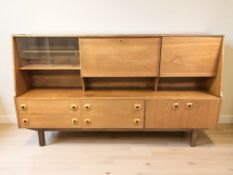 A 20th century teak cocktail sideboard,