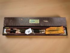 A Parker Hale shotgun cleaning kit.