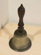 A Victorian brass school bell, height 24 cm.