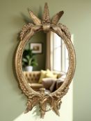 A late-19th century gilt wood and gesso girandole, the oval frame surmounted with foliage, approx.