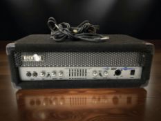 A Richter RB9 amplifier, with lead and two guitar leads.