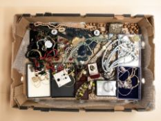 A collection of costume jewellery, lady's wristwatches, bangles, bead necklaces, etc.