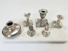 A group of silver including pair of squat candlesticks, pair of sifters,