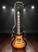 A Harley Benton H3 electric hollow bodied guitar, with soft carry bag and a guitar stand.