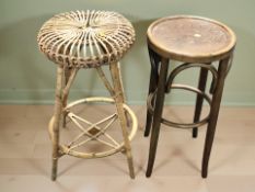 A bentwood stool and similar wicker stool.