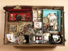 A large quantity of costume jewellery, wristwatches, brooches, simulated pearls, etc.