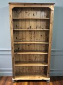 A modern pine open bookcase, 96 cm x 30 cm x 183 cm.