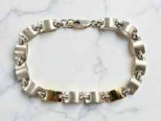 A silver-gilt bracelet,