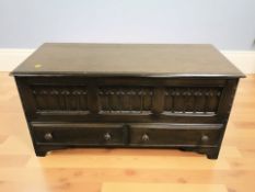 A stained oak blanket box, width 111 cm.