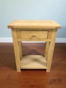 A modern oak single drawer side table, width 65 cm.