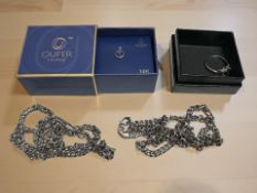 An Oufer 14ct gold body jewellery ring, a silver and moss agate ring,