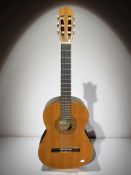 An Angelica Model 2851 acoustic guitar, supplied by Boosey & Hawkes.