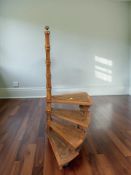 A reproduction spiral library step, height 111 cm.