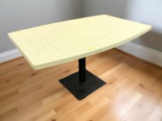 A melamine topped coffee table, 105 cm x 68 cm x 58 cm.