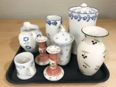 A group of Laura Ashley ceramics including jugs, storage jar, pair of candlesticks.
