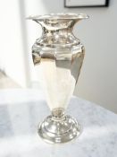 A loaded silver vase, Birmingham marks rubbed, height 27cm.