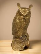 A cast brass figure of an owl, height 22 cm.