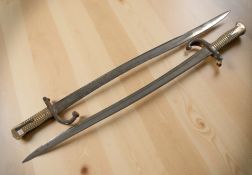 Two French model 1866 Chassepot bayonets.