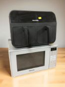 A Panasonic microwave and a Salter airfryer.