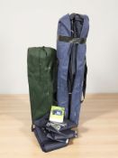 A camping gazebo in carry bag and two folding chairs.