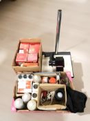 A quantity of camera filters, photography film and paper fixing fluids, other photography items.