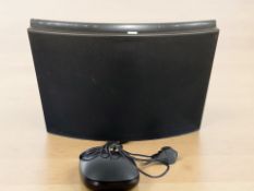 A Bang & Olufsen Beosound 1 with lead and instructions.