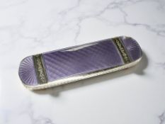 A fine French sterling silver and purple guilloche enamel needle case by Charles Eugène Gouy,