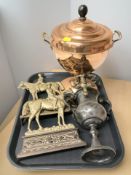 Two Victorian brass door stops, a copper samovar and a pewter twin handled cup.
