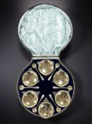 A set of six Victorian silver-gilt salts and spoons, Walker & Hall, Sheffield 1899,