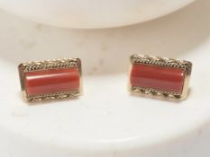 A pair of 18ct gold and red coral cuff links CONDITION REPORT: 9.6g gross.