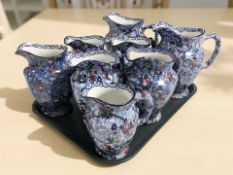 Eight Maling for Ringtons Limited chintz jugs.