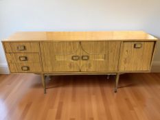 A high gloss teak low sideboard,