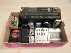 A group of digital cameras including Samsung, together with a Tascam MF-P01 Portastudio,