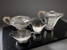 An Art Deco silver four-piece tea service, Frank Cobb & Co Ltd, Sheffield 1935, teapot 18cm high.