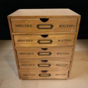 A reproduction French haberdashery chest, width 25 cm.