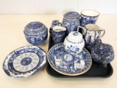 A group of Ringtons porcelain including chintz tea pot and jug, two hexagonal caddies, plates, etc.